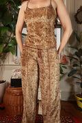 Vintage 2000s Elektra Mudd brown snakeskin print cami and low rise pants set displayed on a hanger.