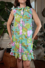 Load image into Gallery viewer, Vintage aqua floral sleeveless shift dress with ruffle hem from Elektra Vintage, 60s-70s style, displayed on a hanger.
