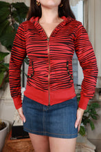 Load image into Gallery viewer, Vintage 2000s Abbey Dawn red and black zebra print cat ear zip-up hoodie, women's top by Elektra Vintage, front view showing details.
