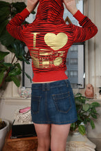 Load image into Gallery viewer, Vintage Abbey Dawn red and black zebra print cat ear zip-up hoodie for women, from Elektra Vintage.
