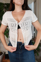Load image into Gallery viewer, White pointelle open-knit cropped cardigan for women, vintage 2000s style by Elektra Vintage, featuring short sleeves and a textured knit.

