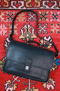 Vintage Coach Metropolitan leather shoulder messenger bag by Elektra Vintage, featuring a classic design and brown leather strap.
