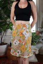 Load image into Gallery viewer, Beige floral print A-line midi skirt by Elektra Vintage, vintage 2000s style with flowy fabric and classic design.

