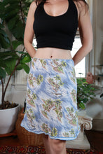 Load image into Gallery viewer, Elektra Vintage 2000s tropical island print A-line midi skirt with vibrant tropical foliage pattern and lightweight fabric.
