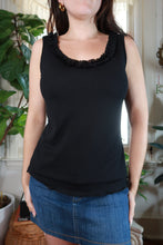 Load image into Gallery viewer, Elektra Vintage black sleeveless women's top with ruffle trim and scoop neck, featuring a vintage-inspired design.
