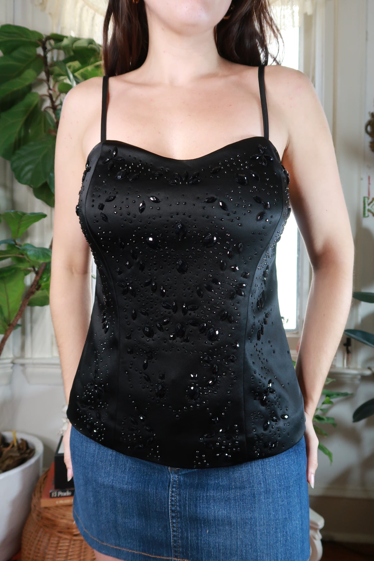 Vintage 2000s Cache black satin beaded rhinestone corset top for women by Elektra Vintage, shown on a dress form.