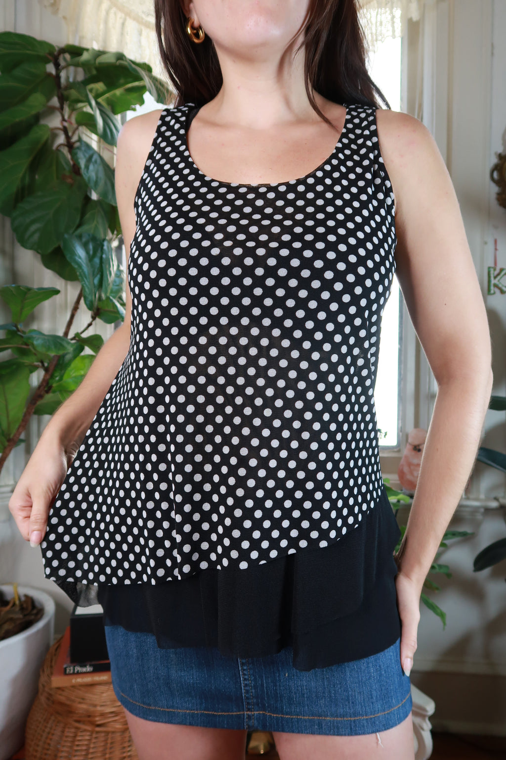 Black and white polka dot layered ruffle tank top for women by Elektra Vintage, showcasing its stylish design and fabric details.