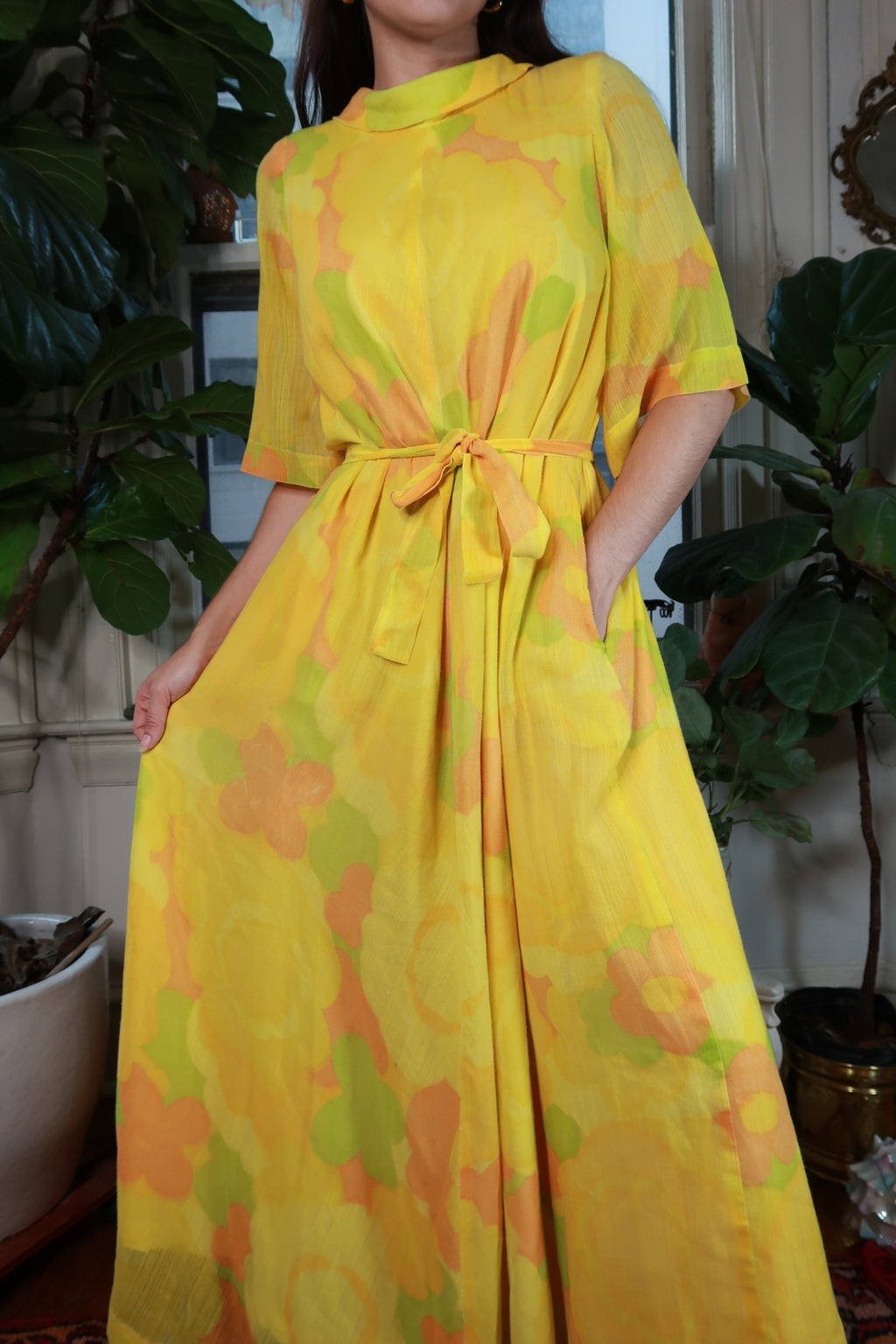 Vintage 60s yellow floral sheer maxi caftan dress by Elektra Vintage, featuring a belted waist and flowing silhouette.