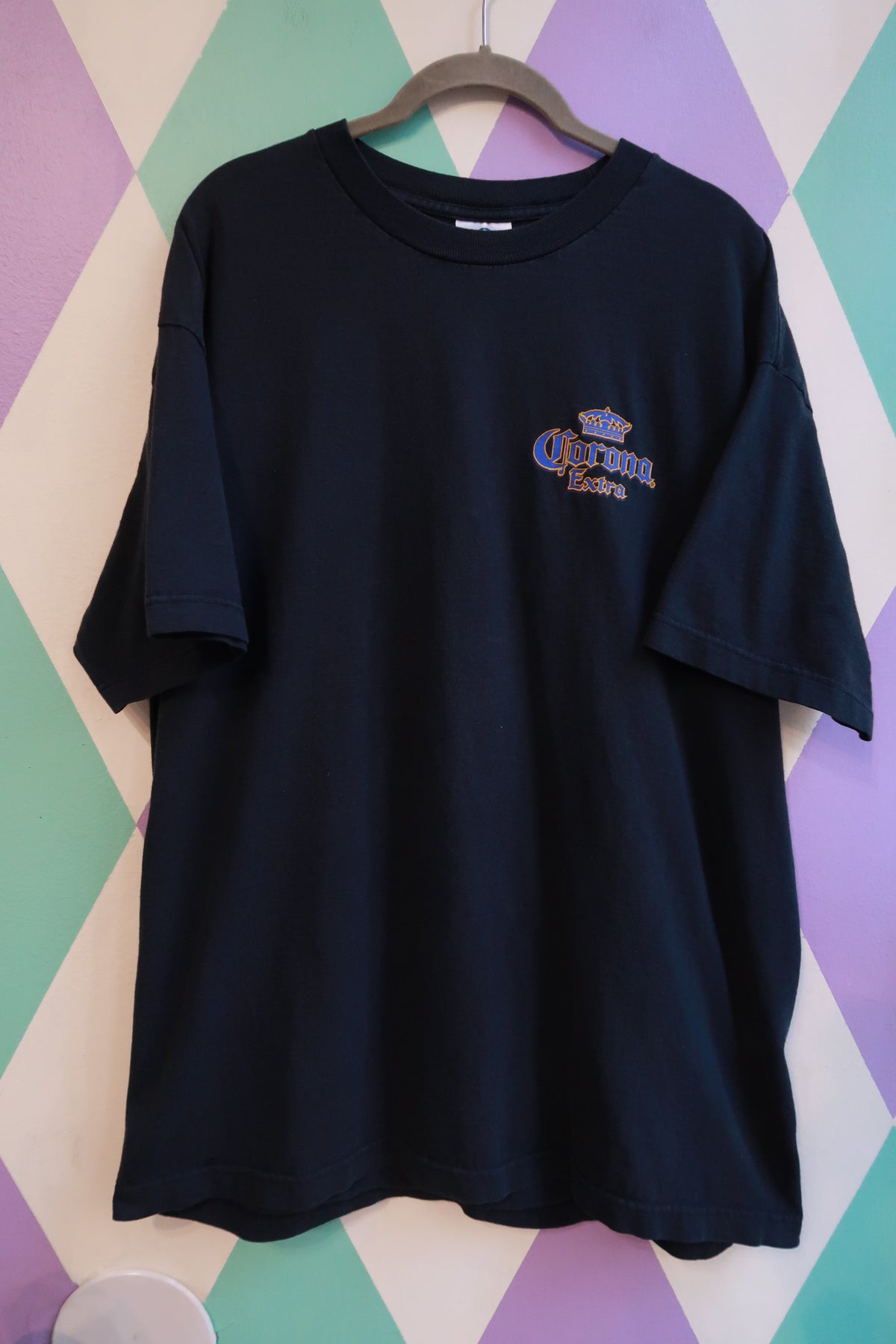 Men's vintage 2000s Corona Extra graphic T-shirt by Elektra Vintage, featuring a classic Corona style print on the front.