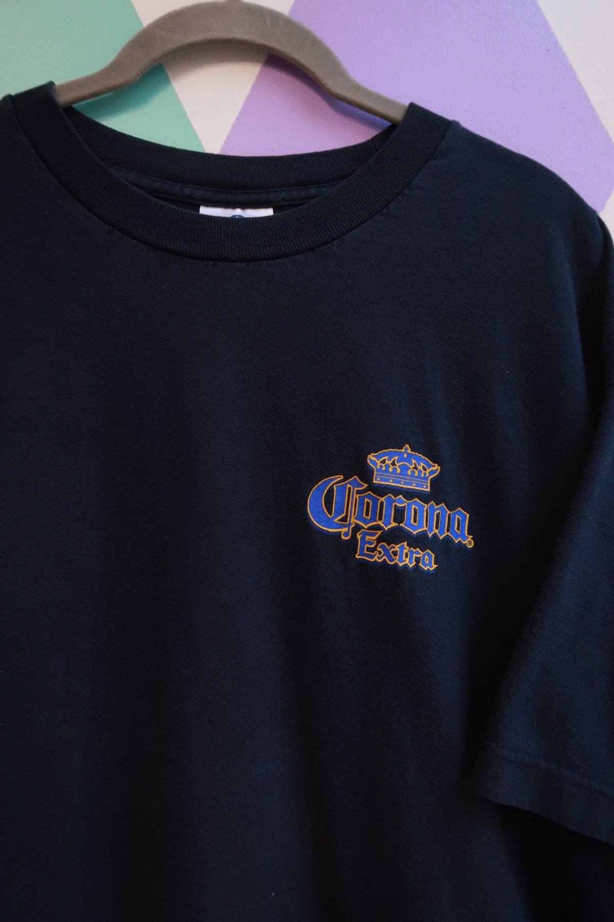 Men's vintage 2000s Corona Extra graphic T-shirt by Elektra Vintage featuring a retro Corona style print.