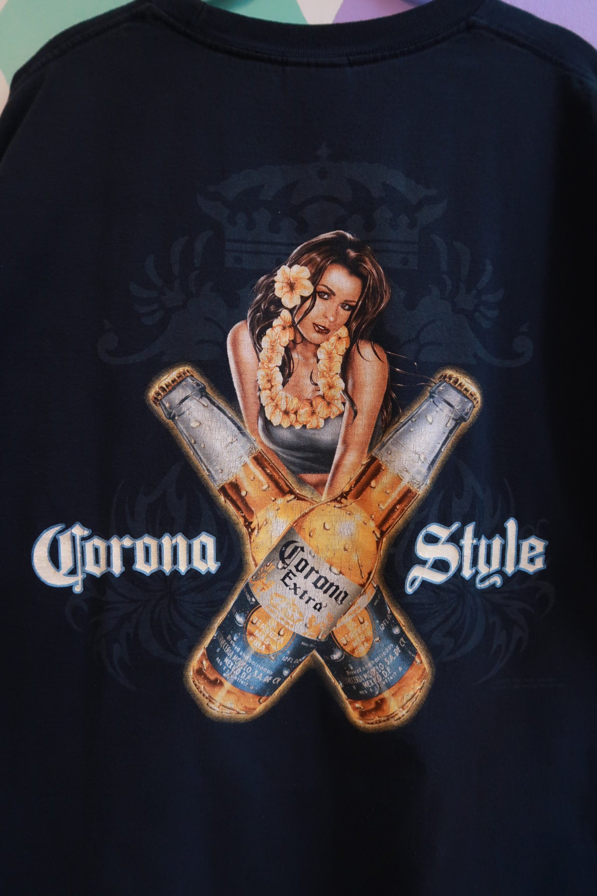 Men's vintage 2000s Corona Extra graphic t-shirt by Elektra Vintage, featuring retro Corona style design and logo.