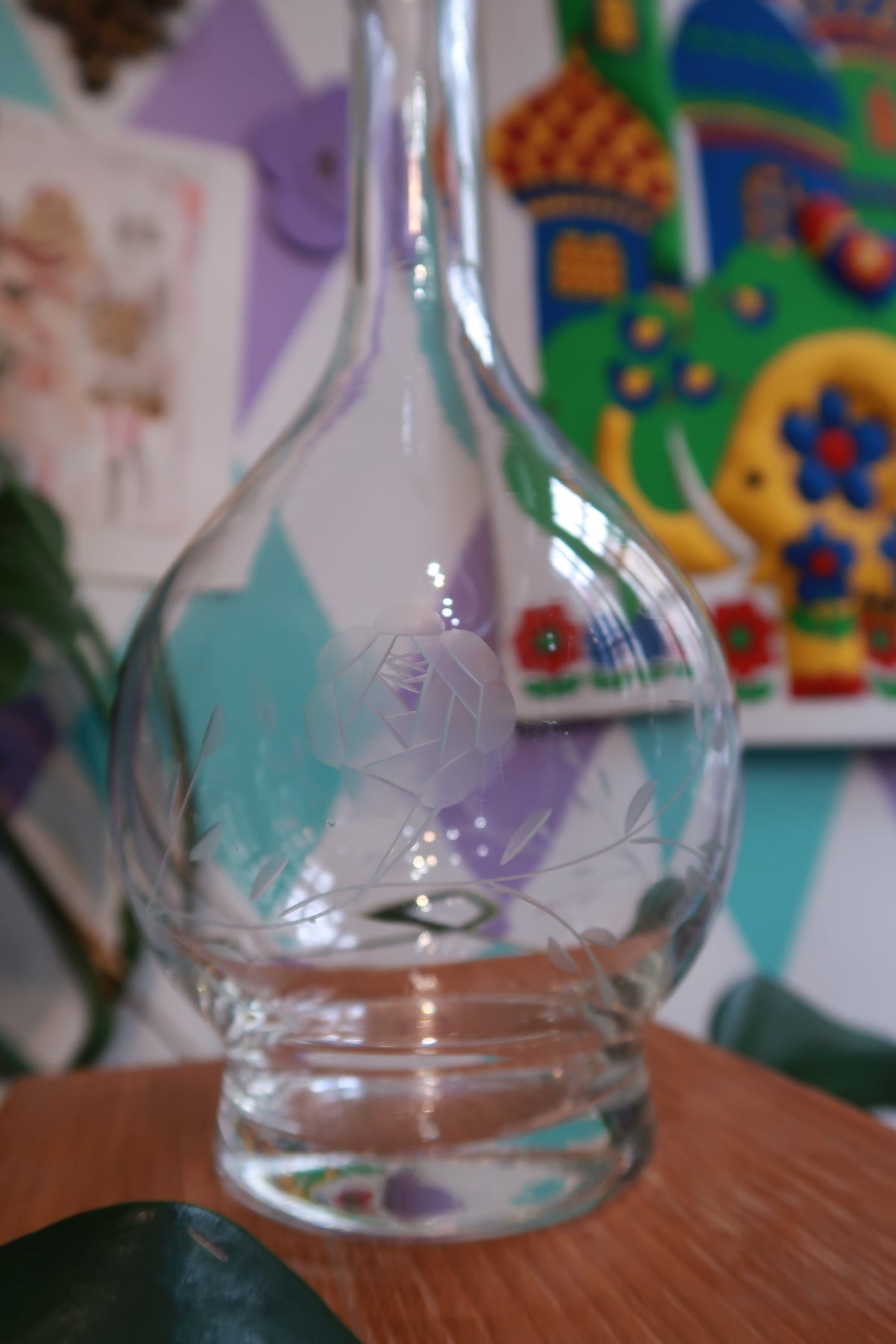 Vintage etched glass decanter with stopper featuring elegant cut floral design, perfect for barware and home décor by Elektra Vintage
