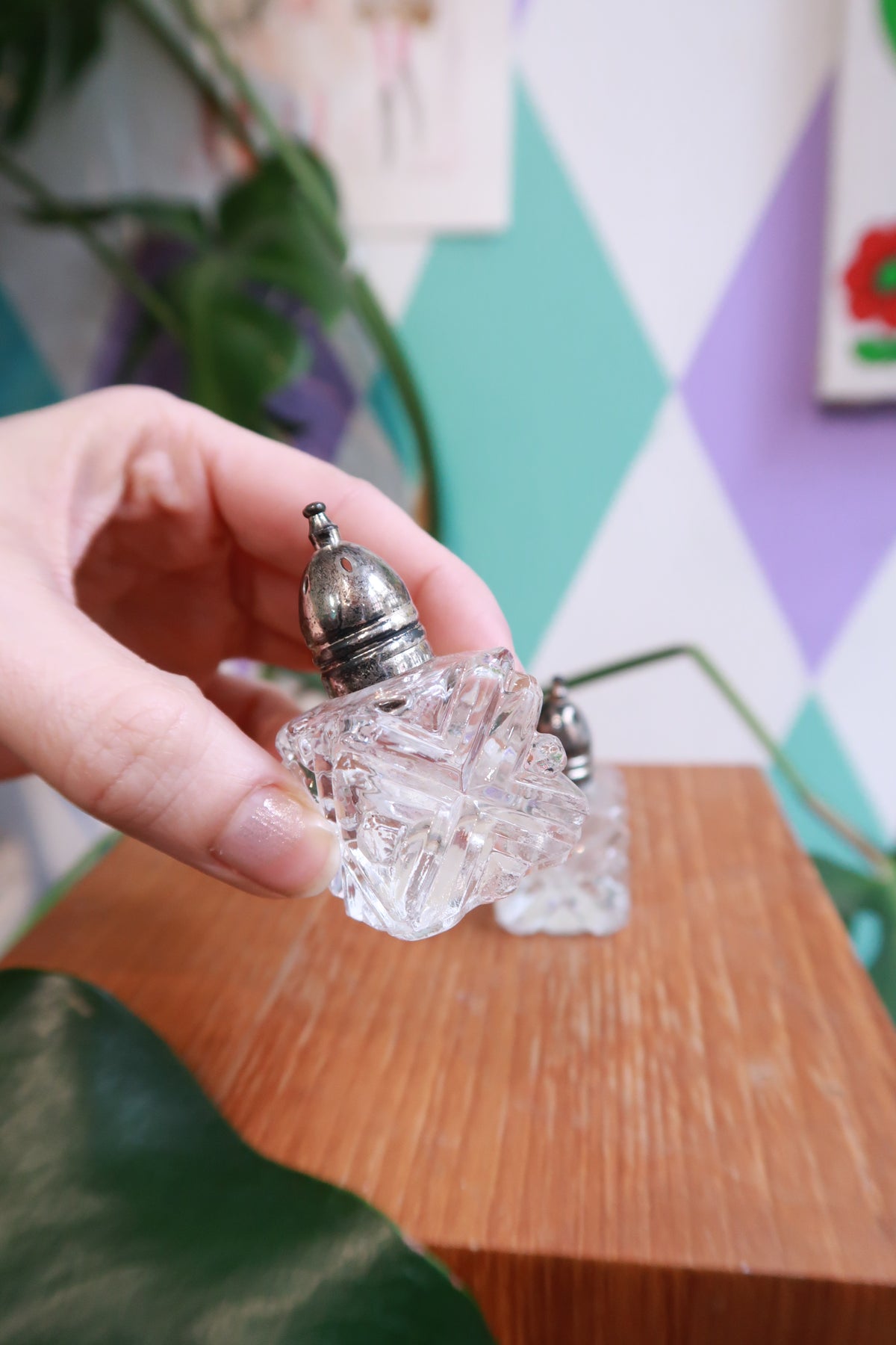 Vintage Elektra Vintage cut glass salt and pepper shakers with diamond pattern, crystal condiment set on a white background.