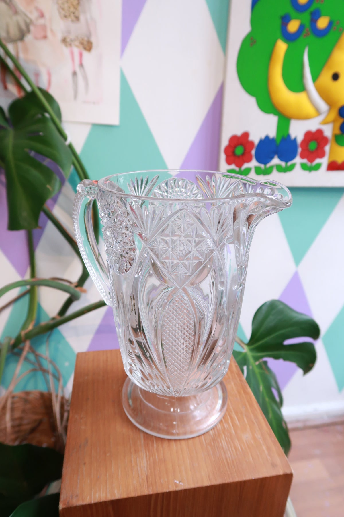 Vintage pressed cut glass pitcher with starburst and fan pattern, pedestal design by Elektra Vintage.