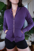 Vintage Y2K Yogi purple zip-up women's jacket by Elektra Vintage, front view showing the stylish hood and zip closure.