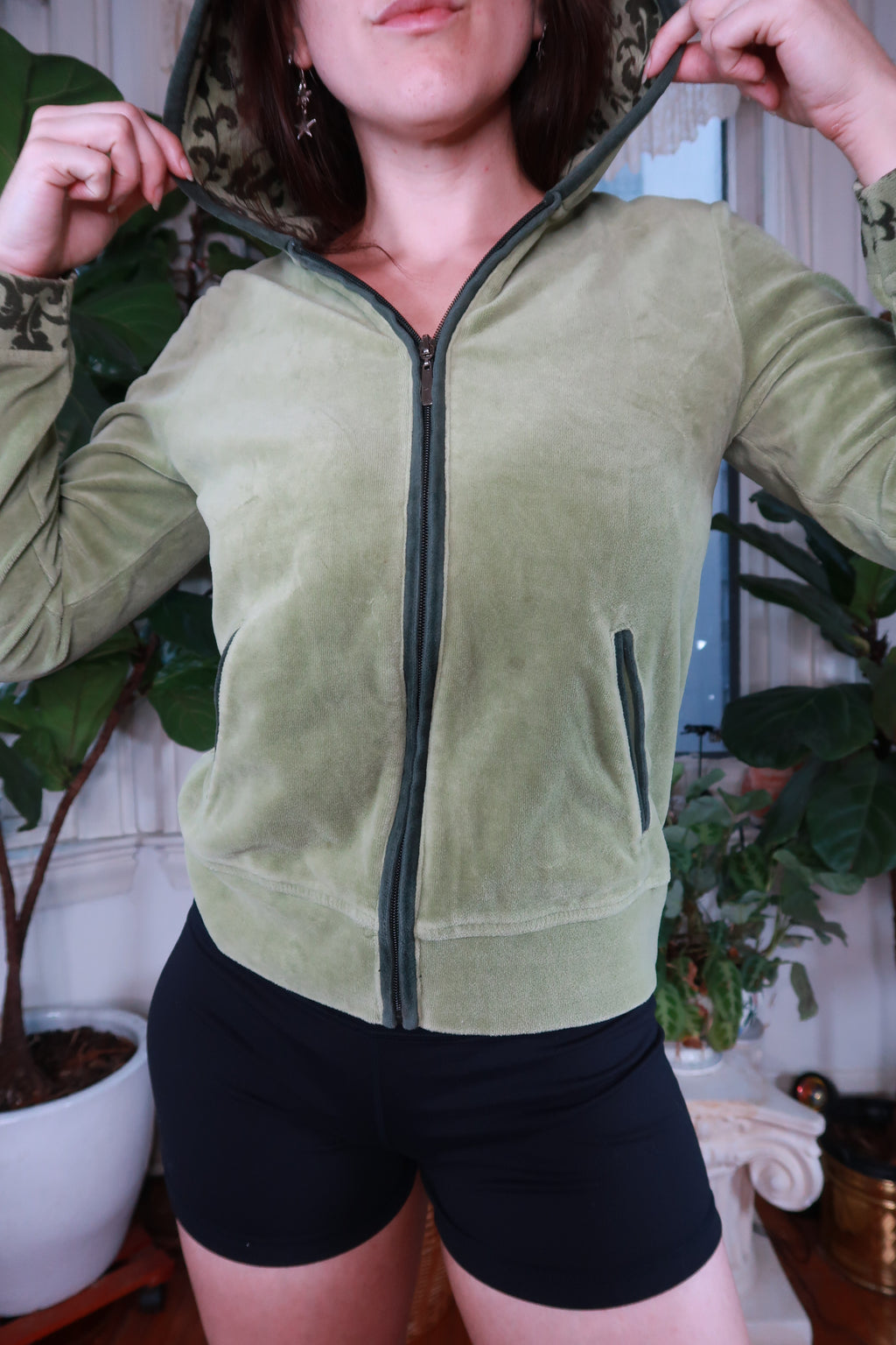 Sage green velour zip-up hoodie for women by Elektra Vintage, vintage Y2K style, soft fabric with front zipper and hood.