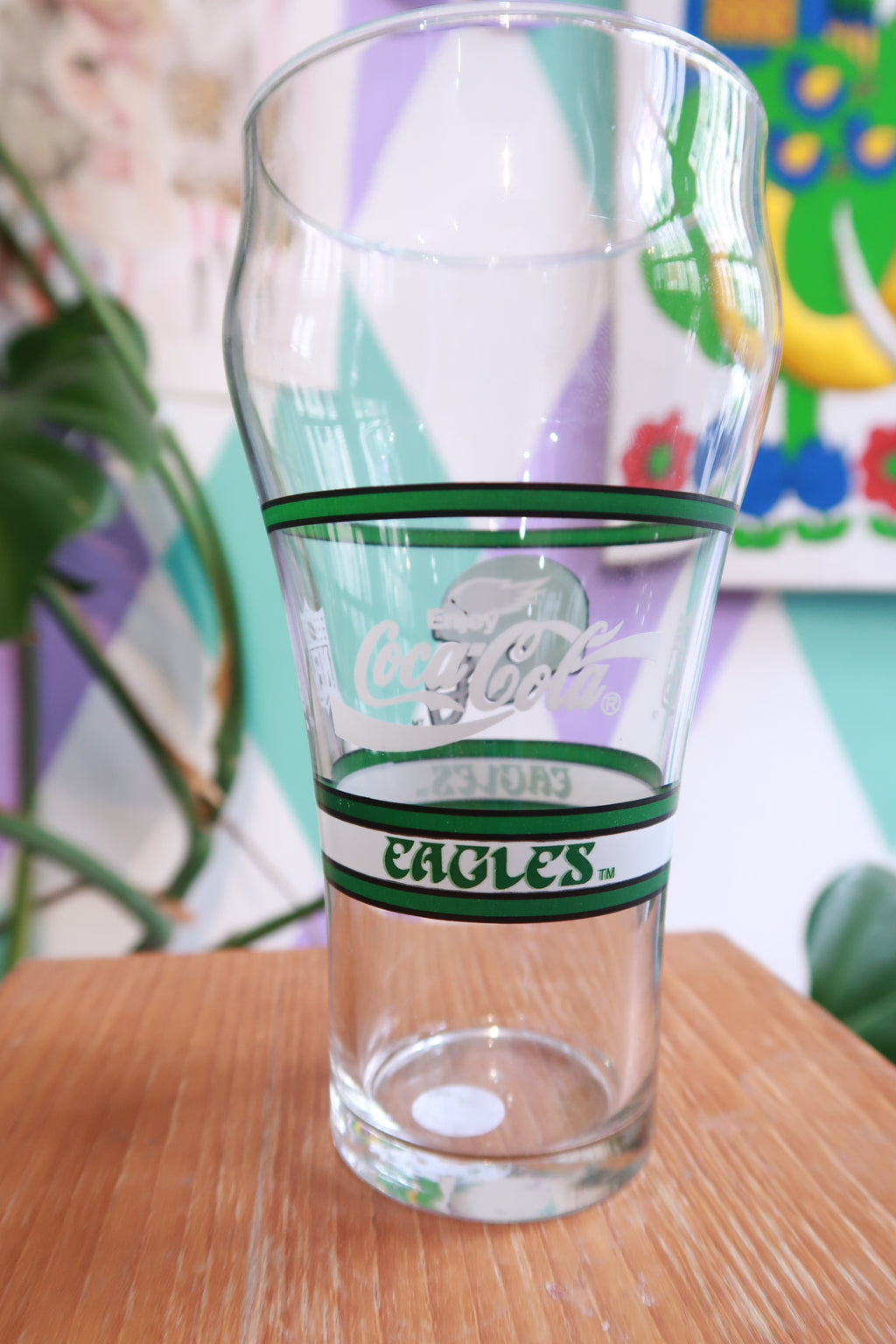 Vintage Philadelphia Eagles NFL pint glass with football helmet logo, bar glass by Elektra Vintage, featuring team branding and clear glass design.