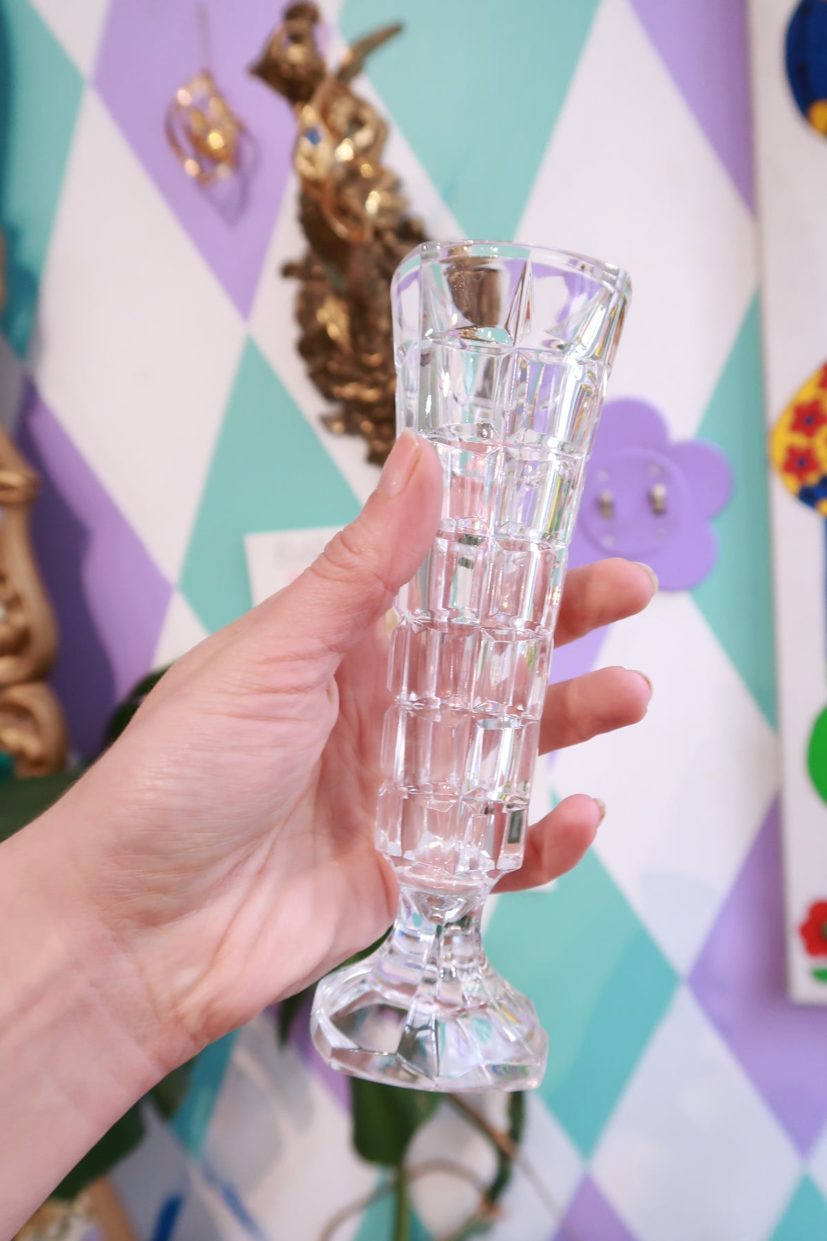 Elegant vintage clear crystal cordial glass with a tall, faceted pedestal design by Elektra Vintage, perfect for liqueurs and spirits.