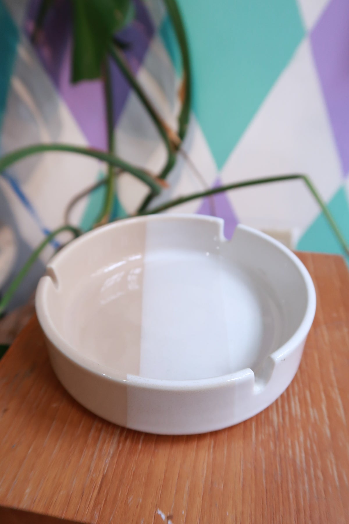 Vintage white and tan stripe ceramic ashtray by Elektra Vintage, featuring a minimalist mid-century modern round design.