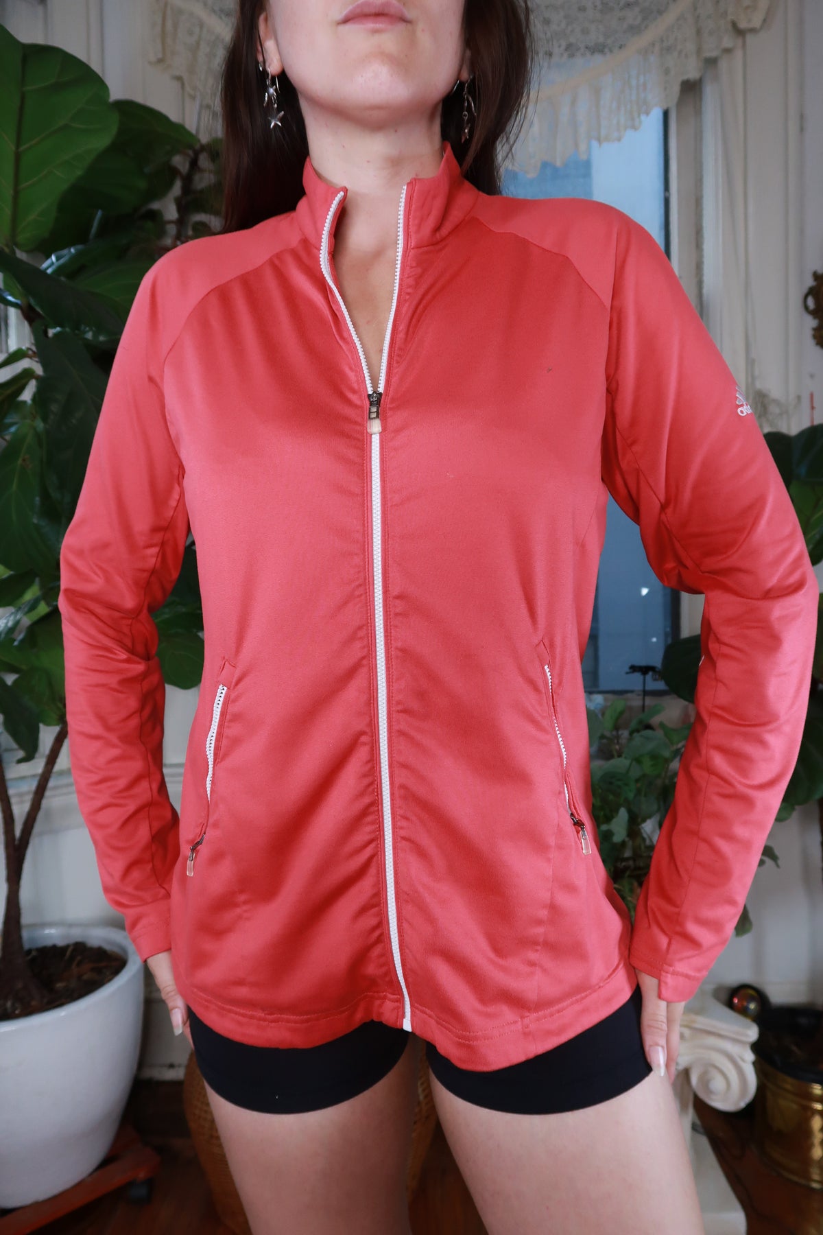 Vintage Y2K Adidas coral pink zip-up track jacket for women, styled with a sporty and retro look.