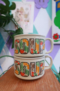 Vintage Elektra Vintage vegetable graphic soup mug set with handles, retro design, featuring colorful vegetable illustrations.