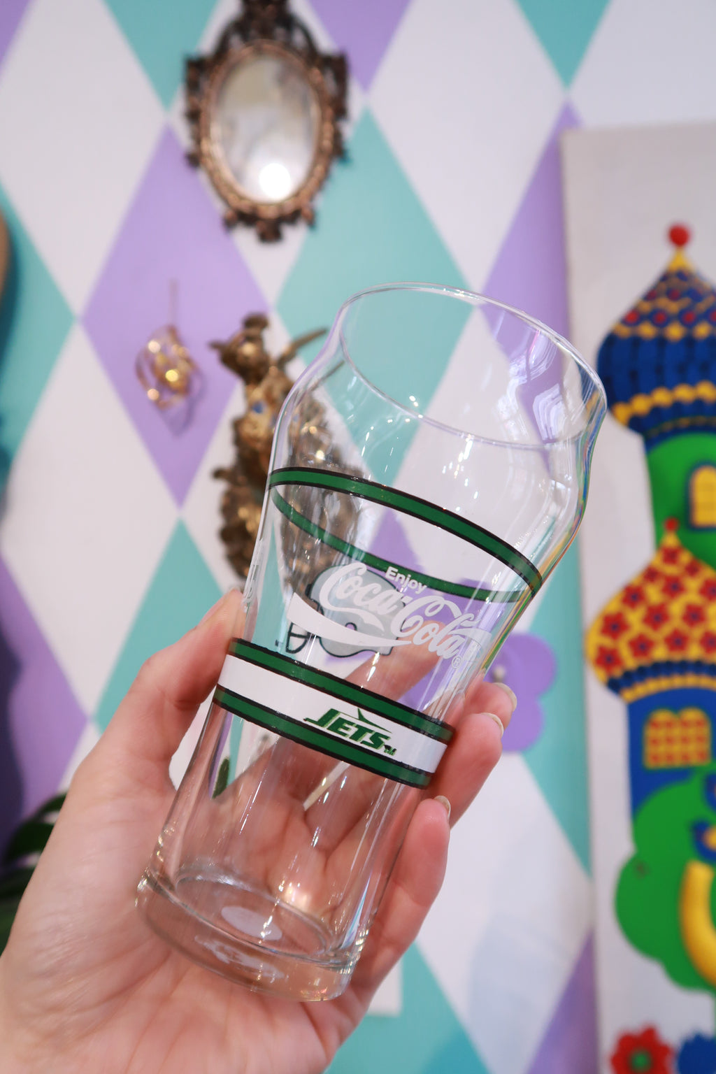 Set of two vintage New York Jets pint glasses featuring retro NFL Jets helmet design by Elektra Vintage.