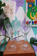 Set of three vintage etched floral wine glasses by Elektra Vintage featuring elegant frosted flower stemware design.