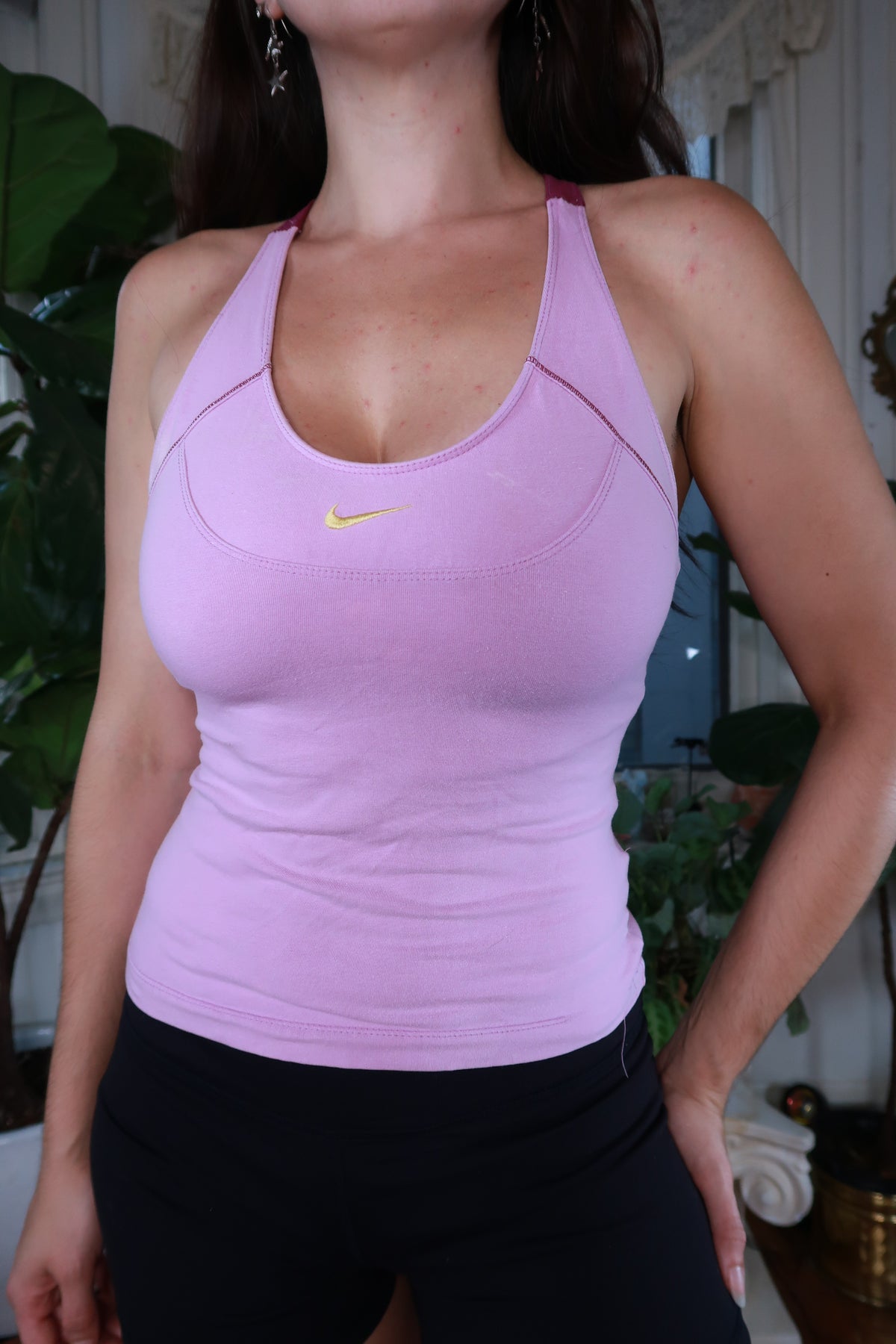 Vintage Y2K Nike Lilac Racerback Tank Top for women, featuring a classic Nike logo and a stylish lilac color.