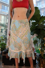 Load image into Gallery viewer, Vintage 2000s patchwork handkerchief hem skirt by Elektra Vintage, featuring colorful fabric patches and a flowy design.
