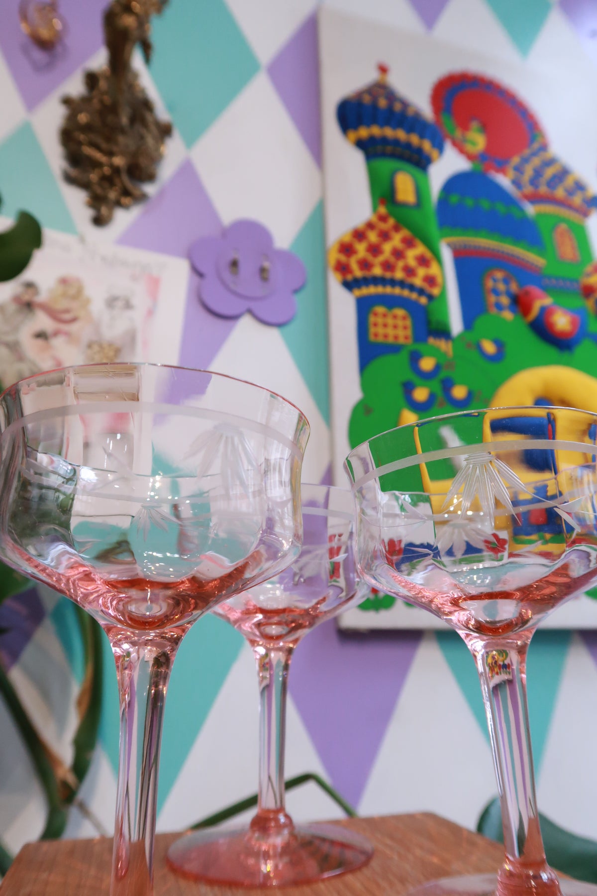 Set of three Elektra Vintage pink stem coupe glasses with etched floral design, blush champagne glasses for elegant drinking.