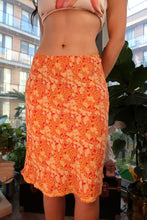 Load image into Gallery viewer, Vintage 2000s GAP orange floral midi skirt with a flowing design, styled by Elektra Vintage.
