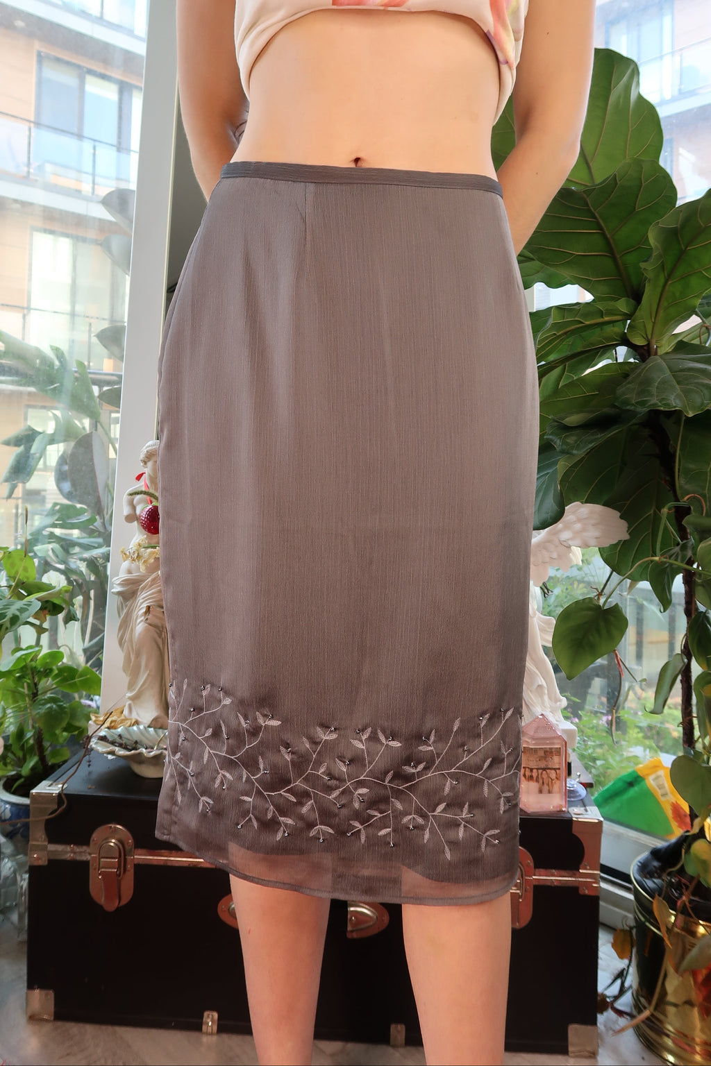 Elektra Vintage 90s sheer overlay midi skirt featuring delicate floral embroidery and a flowing silhouette.
