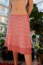 Load image into Gallery viewer, Pink floral skirt from the 2000s vintage collection by Elektra Vintage, featuring a flowy design and vibrant floral pattern.
