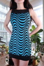 Load image into Gallery viewer, Vintage 2000s blue and black optical print mini dress by Elektra Vintage, featuring a Y2K mod psychedelic shift style.
