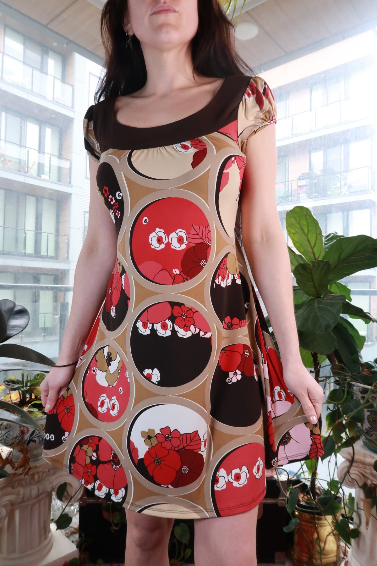Vintage 2000s Elektra Vintage floral circle print mini dress with A-line silhouette, Y2K retro graphic style, and mod floral design.