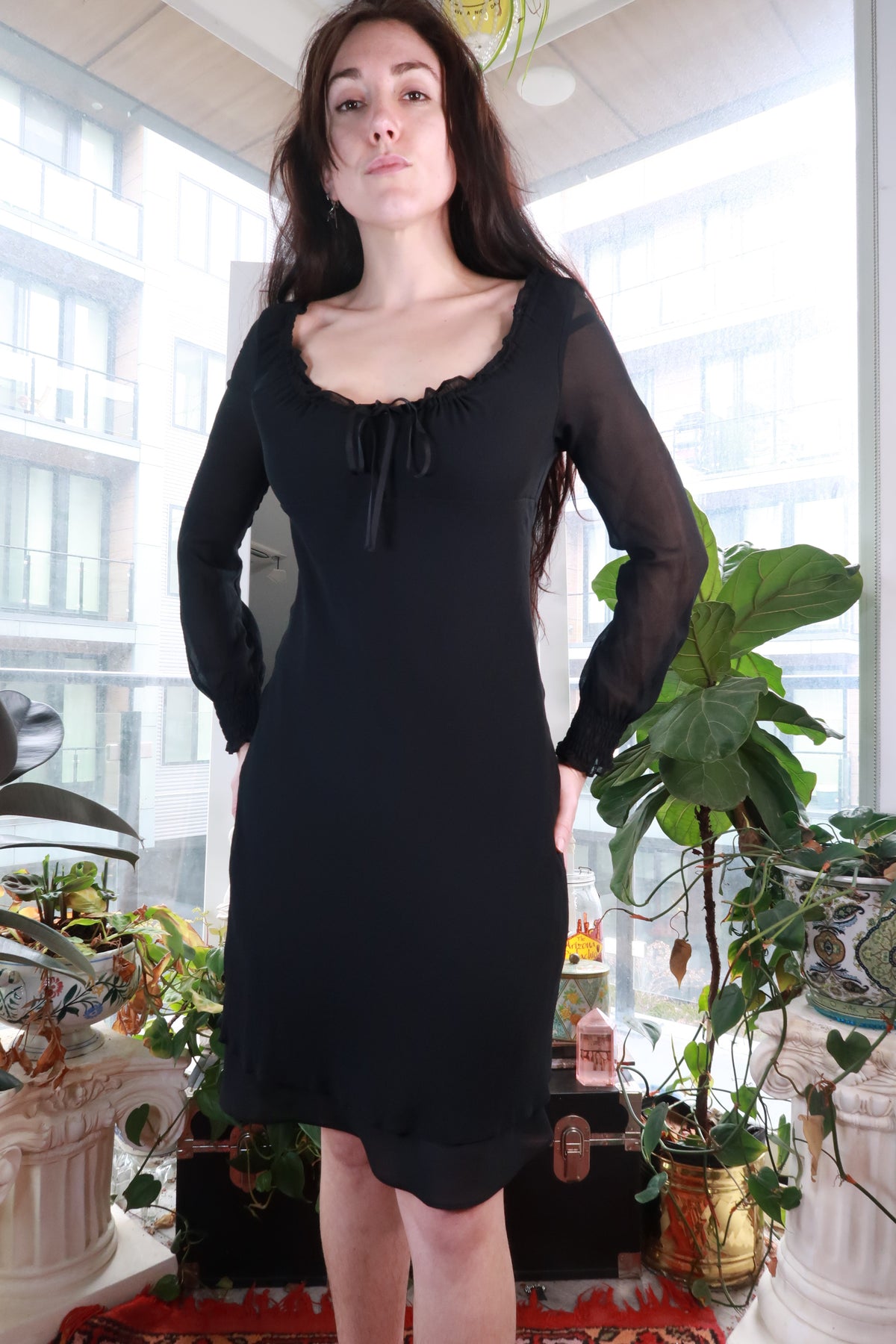 Vintage Elektra Vintage black silk dress with sheer sleeves, ruffle neck tie, and romantic mini length.