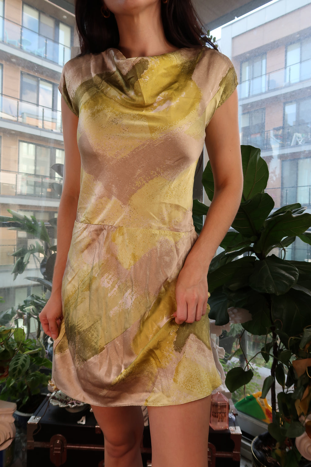 Vintage 2000s Elektra Vintage silk bias cut dress with flowing fabric and elegant silhouette, displayed on a hanger.