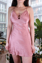 Load image into Gallery viewer, Dusty pink satin slip dress with lace-up front, vintage 2000s Y2K style, by Elektra Vintage, displayed on a hanger.
