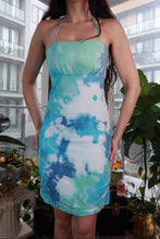 Load image into Gallery viewer, Blue green tie dye cotton halter mini dress by Elektra Vintage, 2000s Y2K ocean-inspired bodycon dress, displayed on a hanger.
