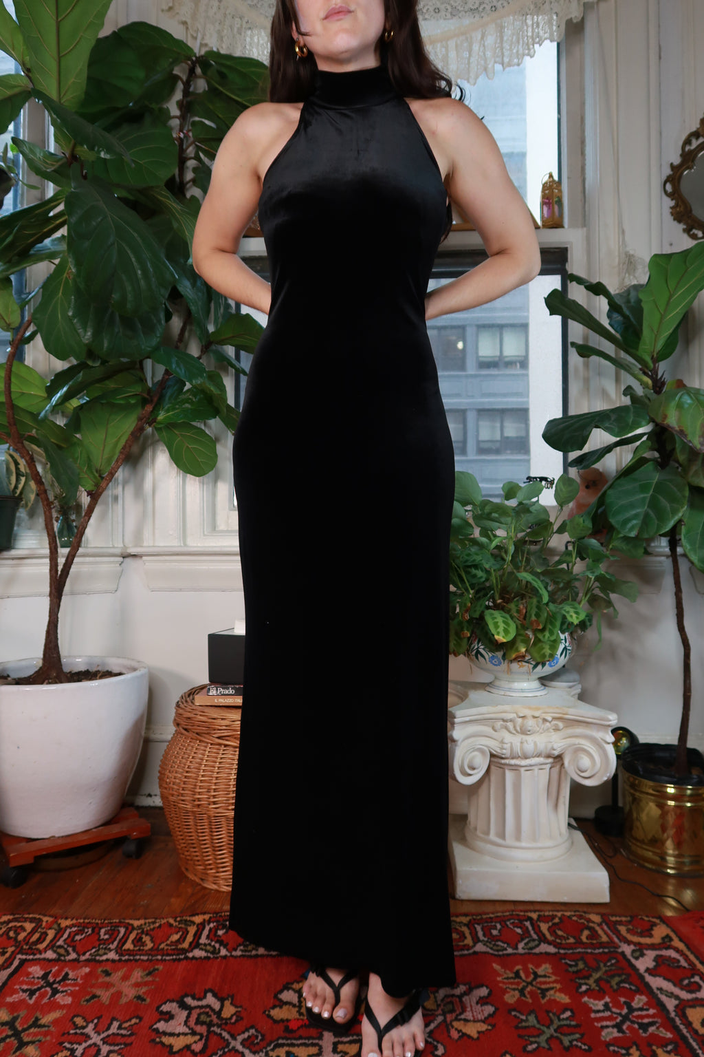 Vintage Ralph Lauren black velvet gown by Elektra Vintage, featuring a flowing dress with elegant long sleeves and classic silhouette.