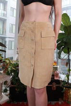 Load image into Gallery viewer, Vintage tan suede button-front skirt with minimalist utility pocket, midi length, by Elektra Vintage.

