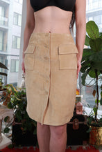 Load image into Gallery viewer, Vintage tan suede button-front skirt with minimalist utility pocket, midi length, by Elektra Vintage, showcasing its stylish design and fabric.

