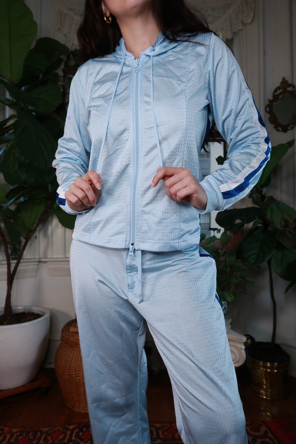 Elektra Vintage women's baby blue mesh Y2K Nike tracksuit top with long sleeves and sporty style.