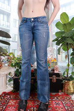 Load image into Gallery viewer, Women's vintage low rise bootcut jeans by Elektra Vintage, medium wash faded Y2K denim, casual retro style.
