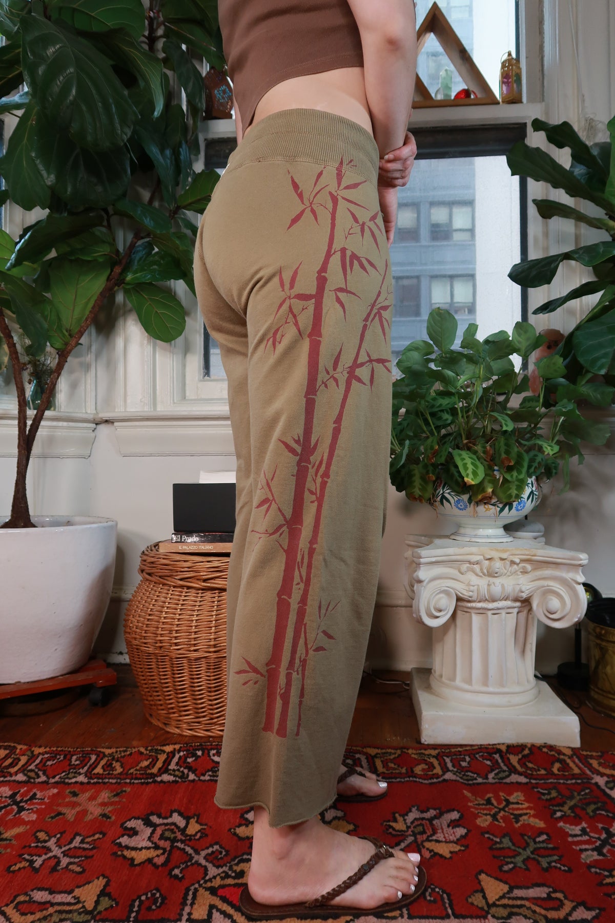 Vintage Y2K Lucky Brand olive green bamboo print women's pants from Elektra Vintage, featuring a relaxed fit and retro style.