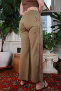 Vintage Y2K Lucky Brand olive green bamboo print women's pants from Elektra Vintage, featuring a relaxed fit and retro style.