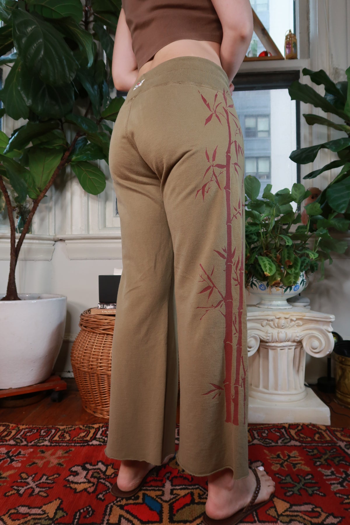 Vintage Y2K Lucky Brand olive green bamboo print women's pants from Elektra Vintage, featuring a relaxed fit and retro style.