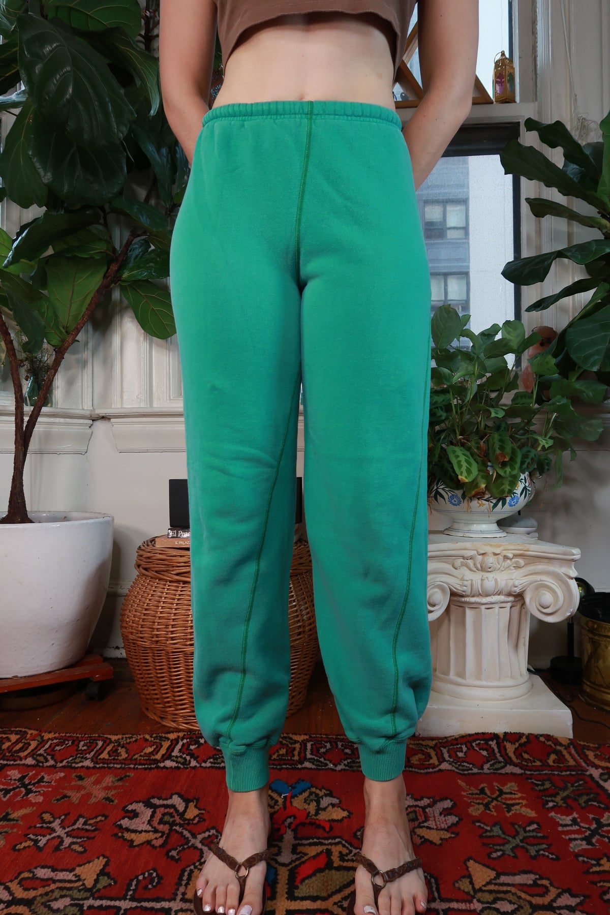 Vintage 90s Ralph Lauren green jogger sweatpants for women, casual athletic bottoms with elastic waistband and relaxed fit.