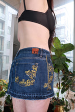 Load image into Gallery viewer, Dark wash vintage 2000s Y2K low rise embroidered denim micro mini skirt by Elektra Vintage.
