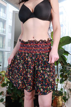 Load image into Gallery viewer, Vintage 2000s Anna Sui floral silk mini skirt with smocked waist and boho garden print, by Elektra Vintage.
